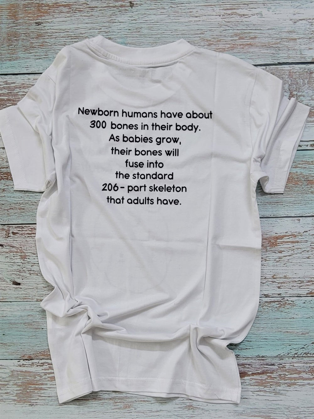 What do Babies Have More Than Adults/ Round Neck Half Sleeve Regular Fit TShirt Brainy Being Apparels S White